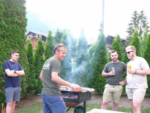 Men cooking on barbecue