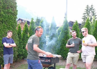 Men cooking on barbecue