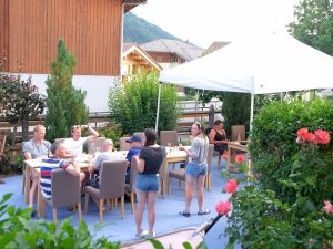 Guests enjoying a barbecue in the garden