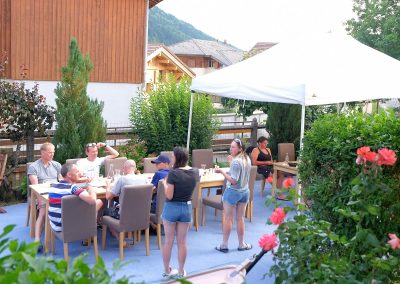 Guests enjoying a barbecue in the garden