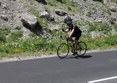 Cyclists riding on a mountain road