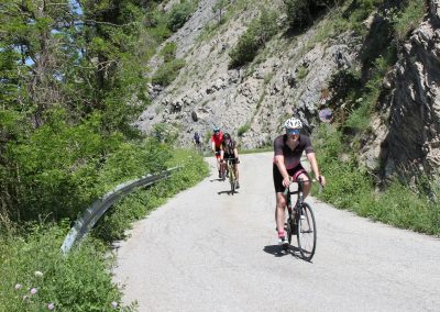 Cyclists riding on a mountain road