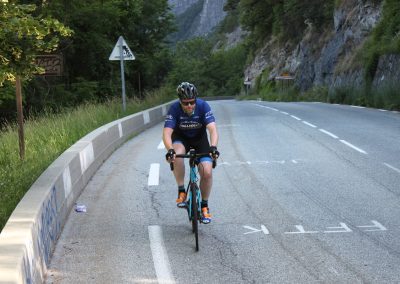 Cyclists riding on a mountain road