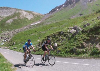 Cyclists riding on a mountain road